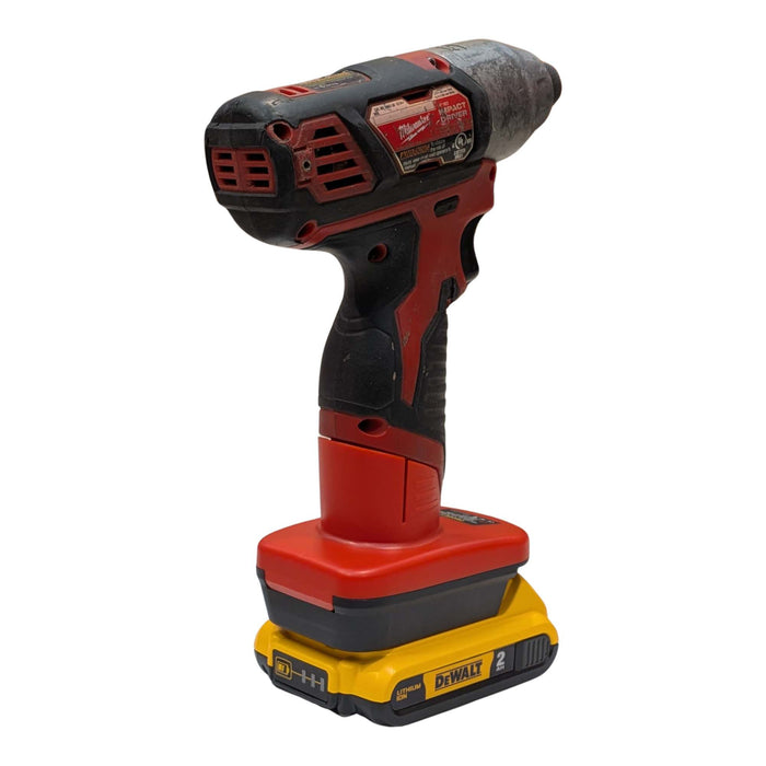 DeWalt 20V MAX to Milwaukee M12 battery adapter - rear view installed on a Milwaukee impact driver, battery below