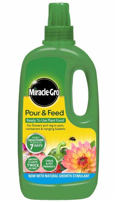 Miracle-Gro Pour and Feed 1Ltr bottle, green and yellow label with orange cap at Pengelly Garden Centre Cornwall