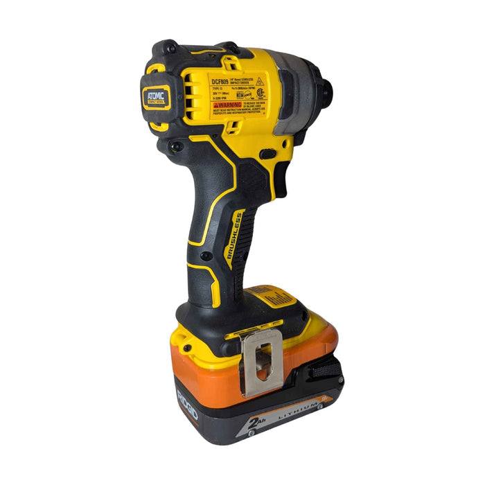 RIDGID 18V to DeWalt 20V MAX battery adapter - impact driver installed on the adapter and battery, rear view